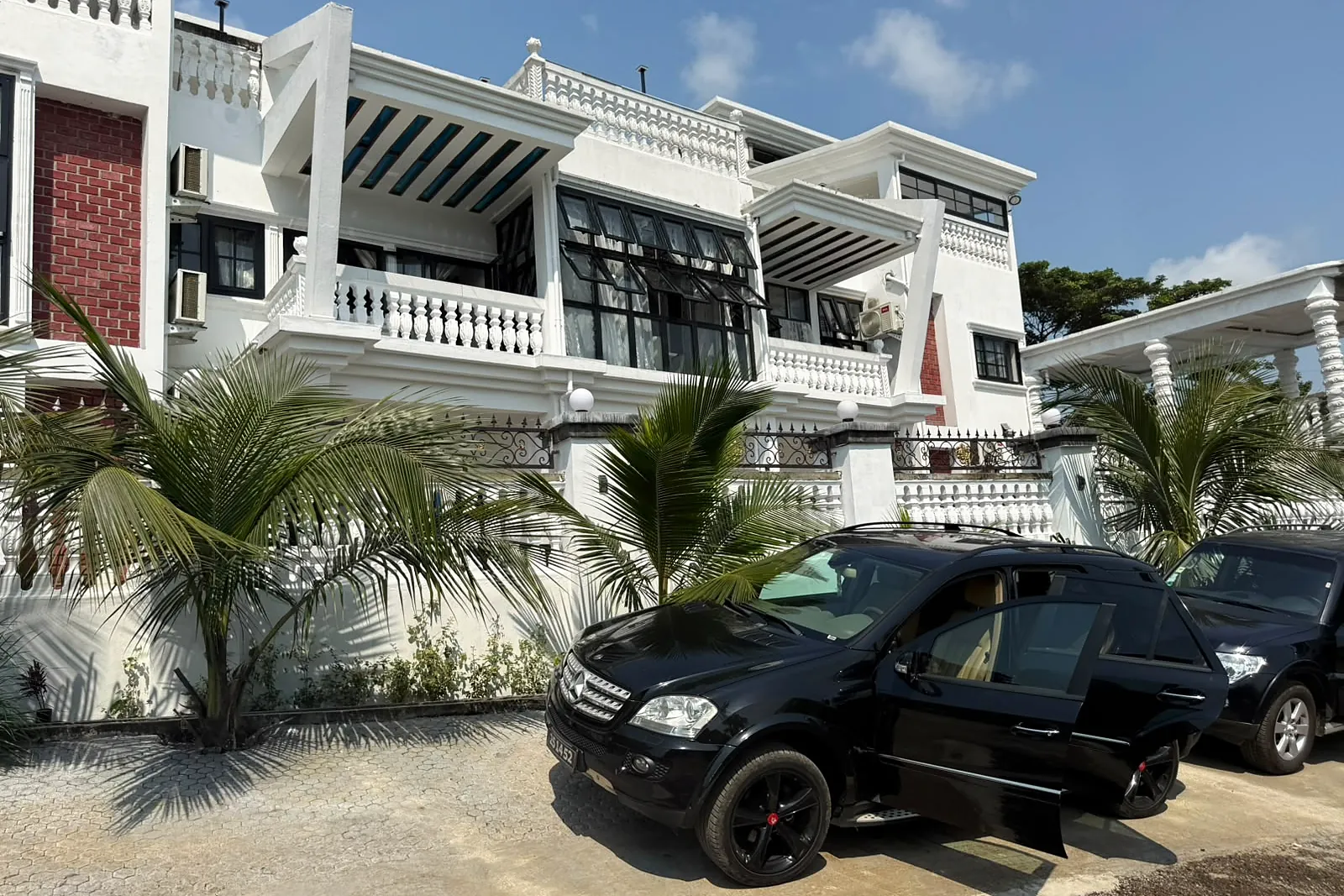 The three levels of the villa against the sky